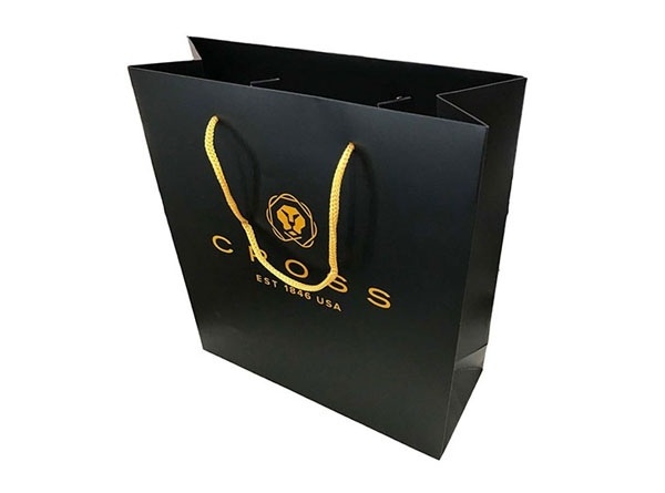 Пакеты из дизайнерской или мелованной бумаги с нанесением логотипа